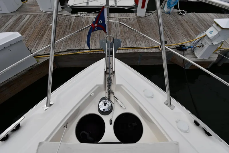 Core Values Yacht Photos Pics Bow view of 2007 Cruisers Yachts 455 Express Motoryacht docked at marina.
