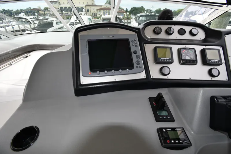 Core Values Yacht Photos Pics Dashboard of 2007 Cruisers Yachts 455 Express Motoryacht with navigation and control instruments.