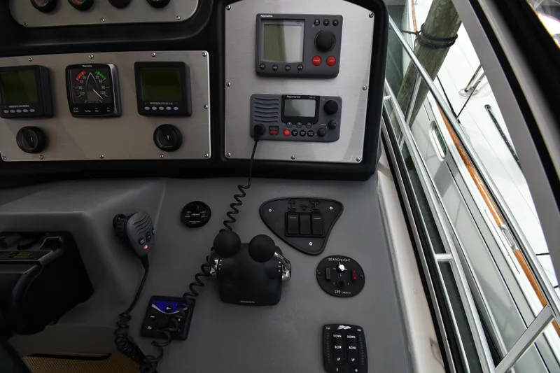 Core Values Yacht Photos Pics Control panel of 2007 Cruisers Yachts 455 Express Motoryacht with navigation instruments.