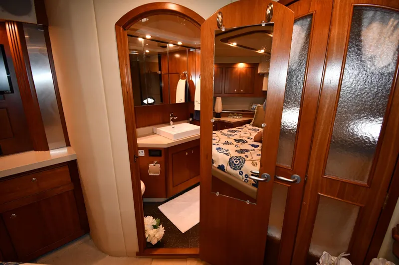Core Values Yacht Photos Pics Luxurious 2007 Cruisers Yachts 455 Express Motoryacht interior with elegant wood finishes.
