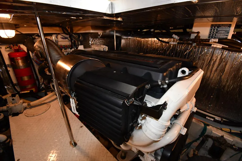 Core Values Yacht Photos Pics Engine room of 2007 Cruisers Yachts 455 Express Motoryacht, featuring mechanical components.