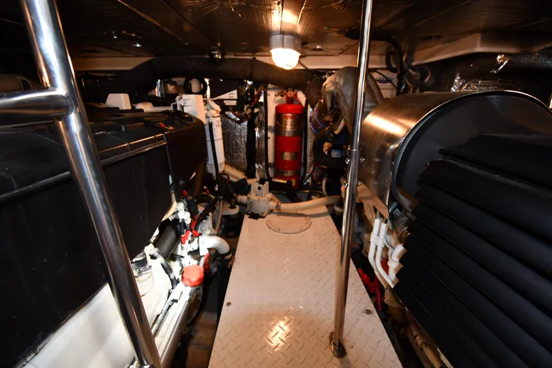 Core Values Yacht Photos Pics Engine room of 2007 Cruisers Yachts 455 Express Motoryacht, featuring mechanical components.