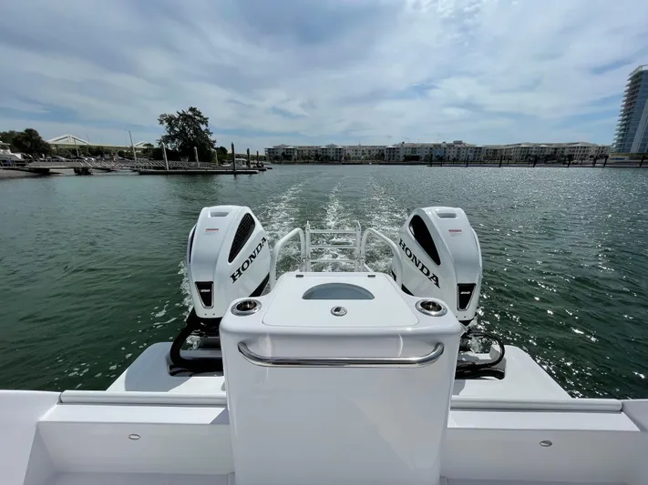  Yacht Photos Pics ArrowCat 320 boat with dual Honda outboard engines cruising on a sunny day, 2025 model.