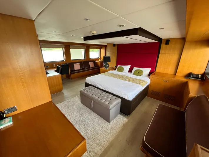  Yacht Photos Pics Luxurious 2012 Superyacht 128 interior with modern bedroom, wood paneling, and elegant furnishings.