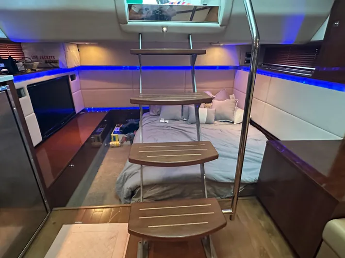  Yacht Photos Pics Interior of 2010 Sea Ray 450 Sundancer yacht with modern design and cozy sleeping area.