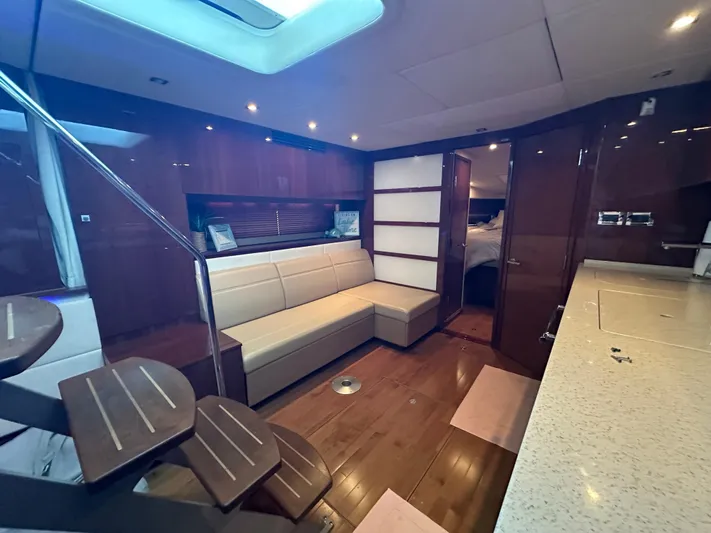 Yacht Photos Pics Luxurious interior of 2010 Sea Ray 450 Sundancer yacht with modern furnishings.