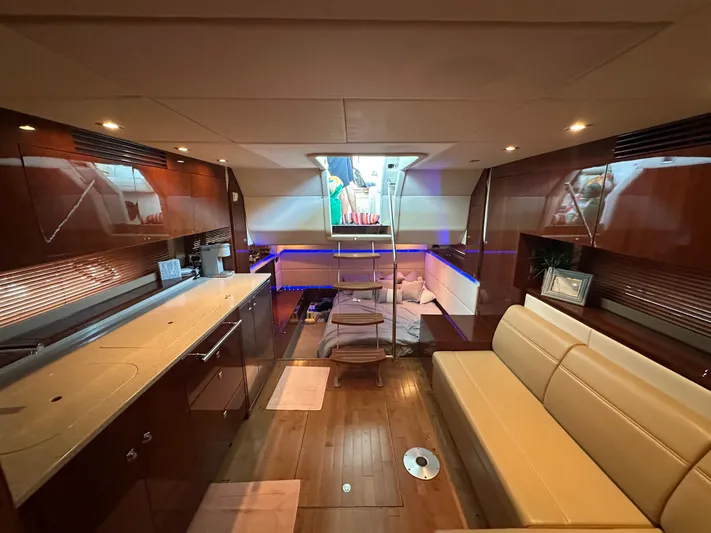  Yacht Photos Pics Luxurious interior of 2010 Sea Ray 450 Sundancer yacht with modern amenities and elegant design.