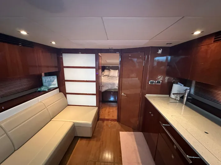  Yacht Photos Pics Luxurious interior of 2010 Sea Ray 450 Sundancer yacht with modern furnishings.