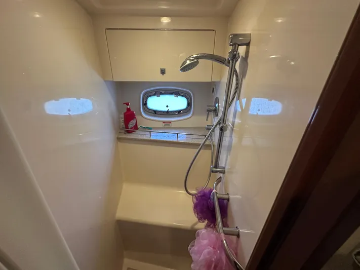  Yacht Photos Pics Shower area in 2010 Sea Ray 450 Sundancer yacht with window and showerhead.