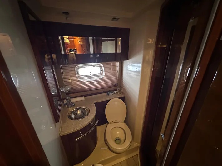  Yacht Photos Pics Luxurious bathroom in 2010 Sea Ray 450 Sundancer yacht with modern fixtures.