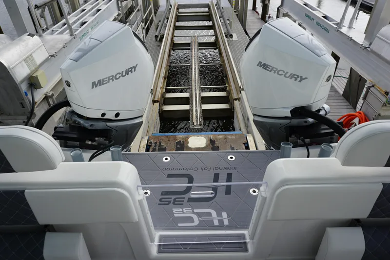 Obsession II Yacht Photos Pics 2023 Insetta 35IFC boat with dual Mercury outboard engines at dock.