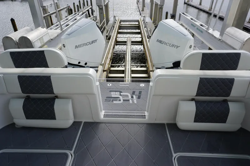 Obsession II Yacht Photos Pics 2023 Insetta 35IFC boat with dual Mercury engines, docked with quilted seating.