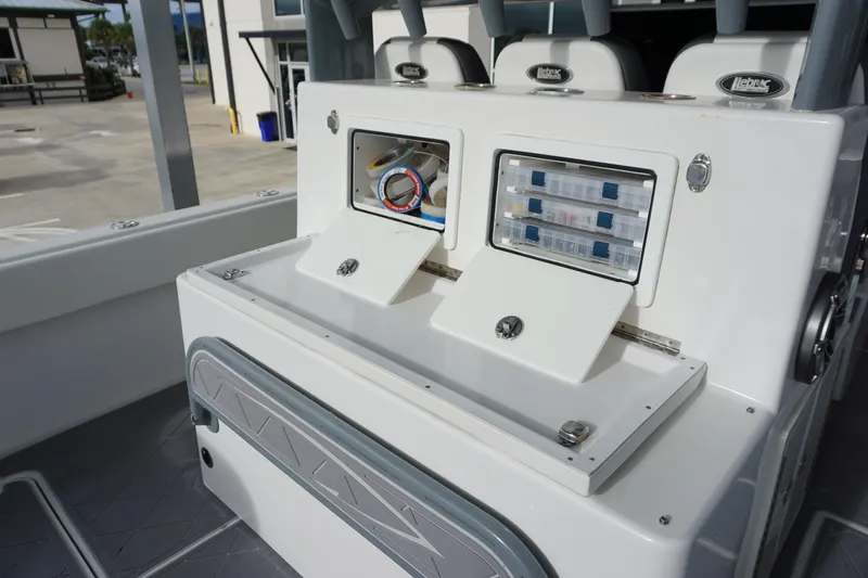 Obsession II Yacht Photos Pics 2023 Insetta 35IFC boat interior with storage compartments and seating.