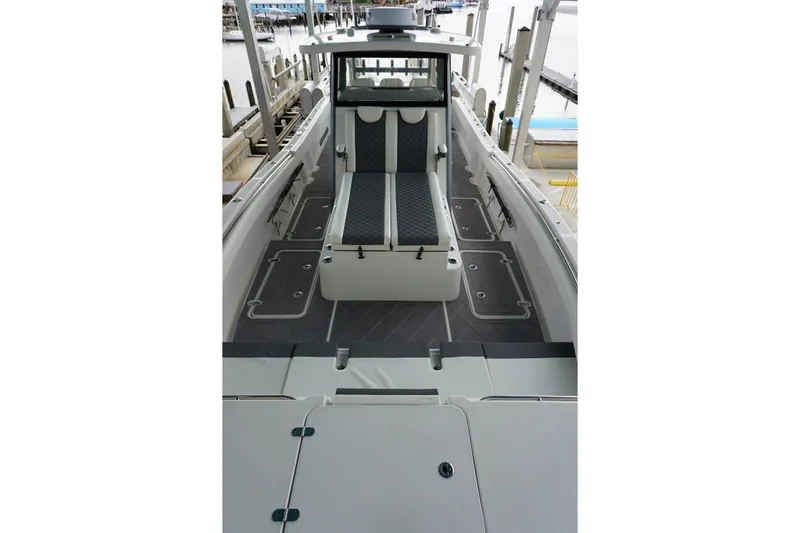 Obsession II Yacht Photos Pics 2023 Insetta 35IFC boat interior with sleek seating and modern design.