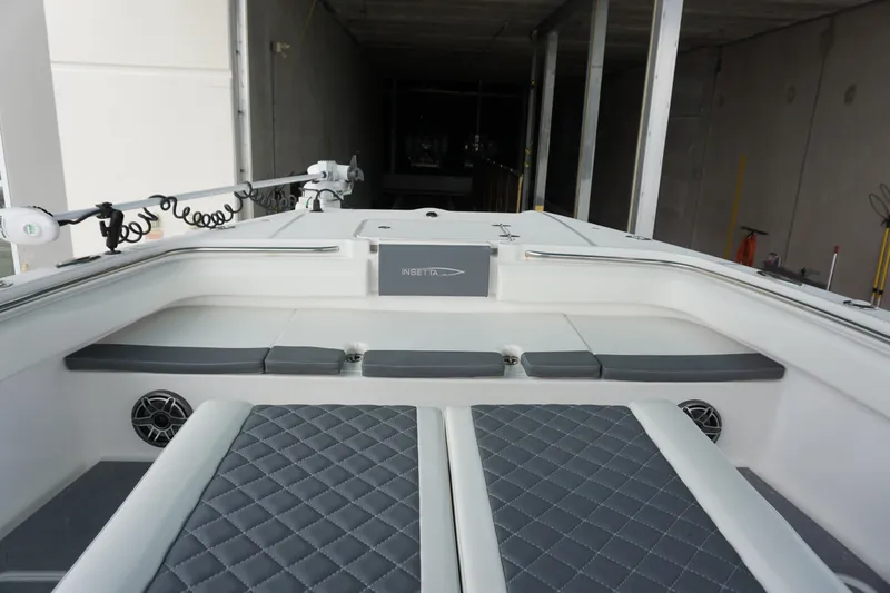 Obsession II Yacht Photos Pics 2023 Insetta 35IFC boat interior with cushioned seating and modern design.