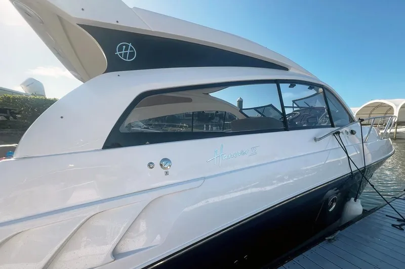  Yacht Photos Pics 2024 Hanover 375 yacht docked, showcasing sleek design and modern features.