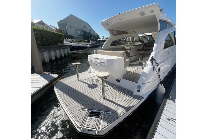  Yacht Photos Pics Luxury Hanover 375 yacht docked, showcasing sleek design and spacious deck, 2024 model.
