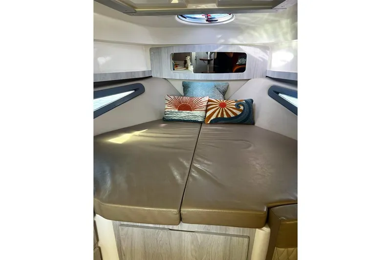  Yacht Photos Pics Luxurious interior of 2024 Hanover 375 boat with stylish cushions and modern design.