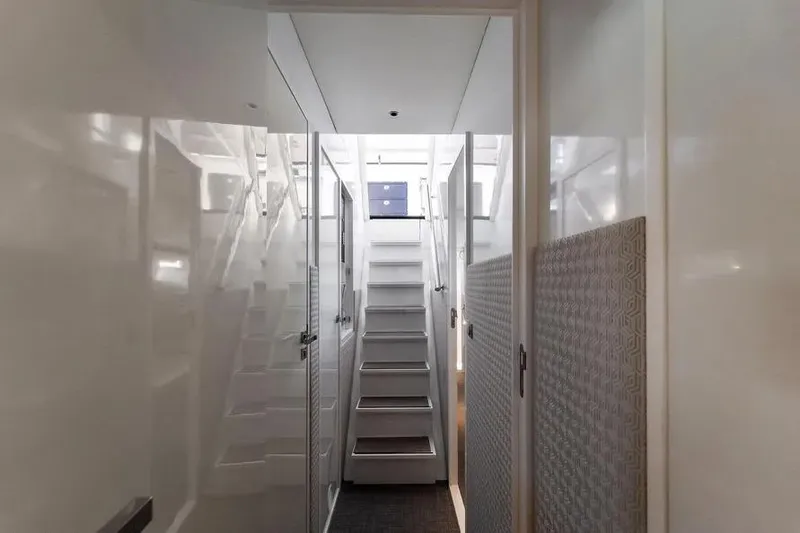  Yacht Photos Pics Interior view of 2019 DutchCraft 56 Open yacht, featuring sleek white stairs and modern design.