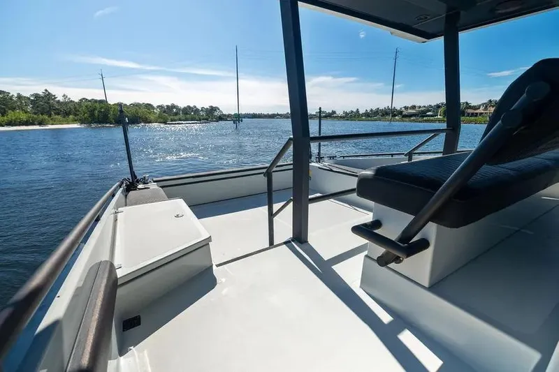  Yacht Photos Pics 2019 DutchCraft 56 Open yacht interior with scenic waterway view.