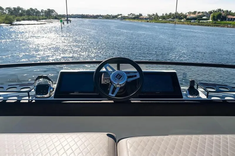  Yacht Photos Pics Helm of 2019 DutchCraft 56 Open yacht with scenic waterway view.
