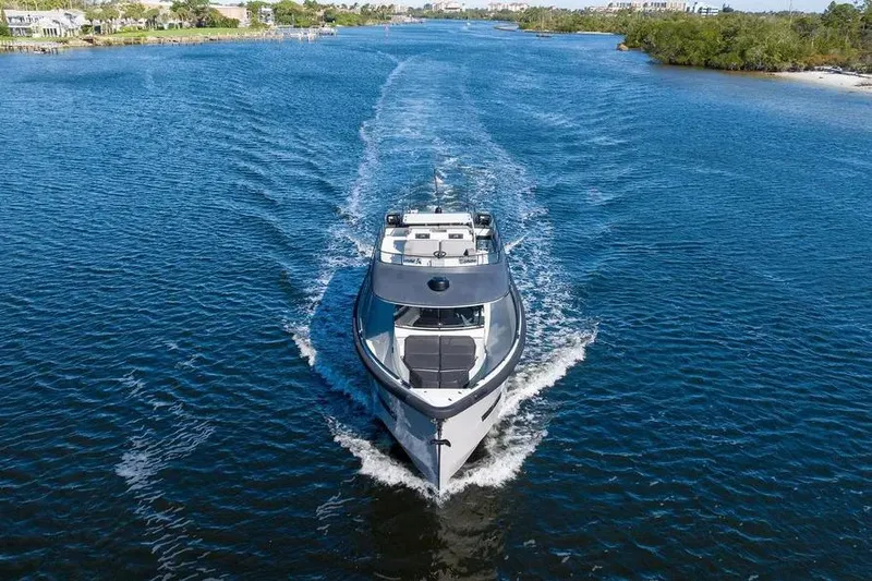  Yacht Photos Pics 2019 DutchCraft 56 Open yacht cruising on a serene waterway.