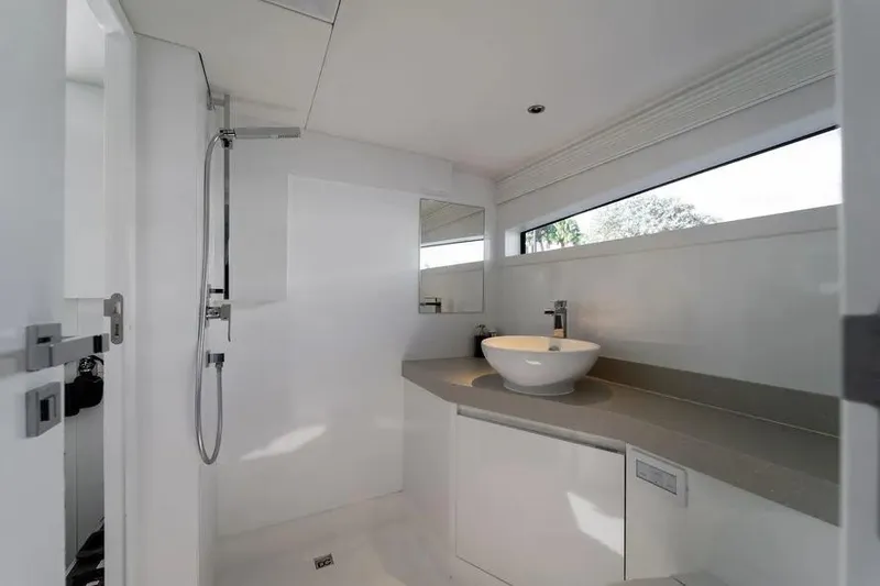  Yacht Photos Pics Modern bathroom interior on 2019 DutchCraft 56 Open yacht, featuring sleek design and fixtures.