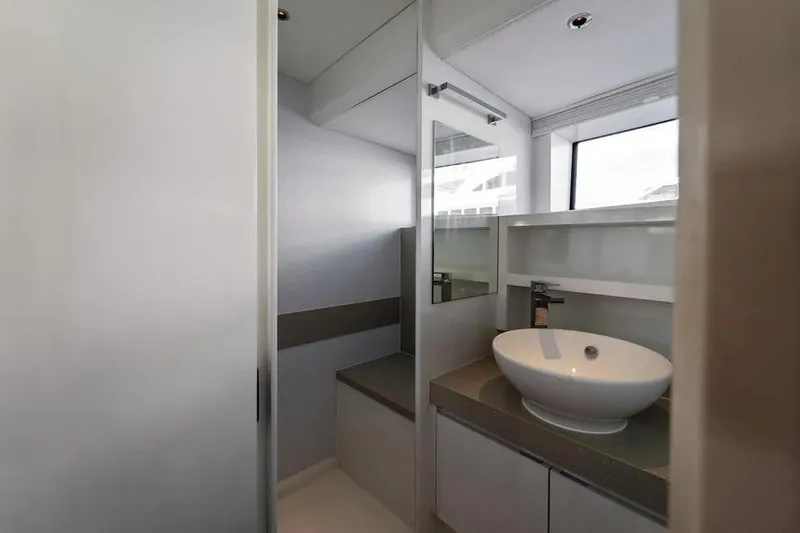  Yacht Photos Pics Modern bathroom interior on 2019 DutchCraft 56 Open yacht, featuring sleek design and round basin.