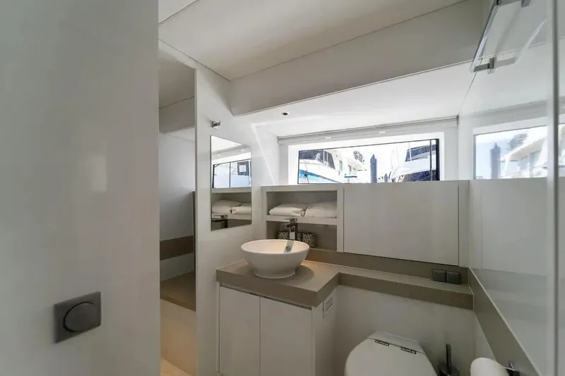  Yacht Photos Pics Modern bathroom interior on 2019 DutchCraft 56 Open yacht, featuring sleek design and natural light.
