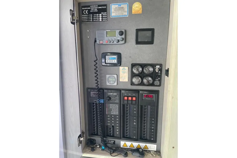  Yacht Photos Pics Electrical control panel of a 2015 Leopard 58 yacht with various switches and gauges.
