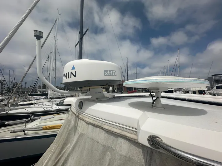 Panacea Yacht Photos Pics Radar equipment on a 2015 Regal 35 Sport Coupe yacht in a marina.