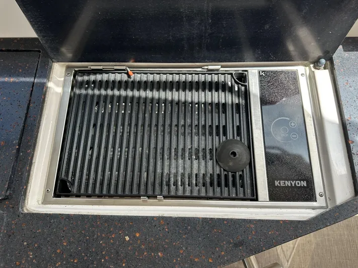 Panacea Yacht Photos Pics Built-in Kenyon grill on 2015 Regal 35 Sport Coupe yacht.