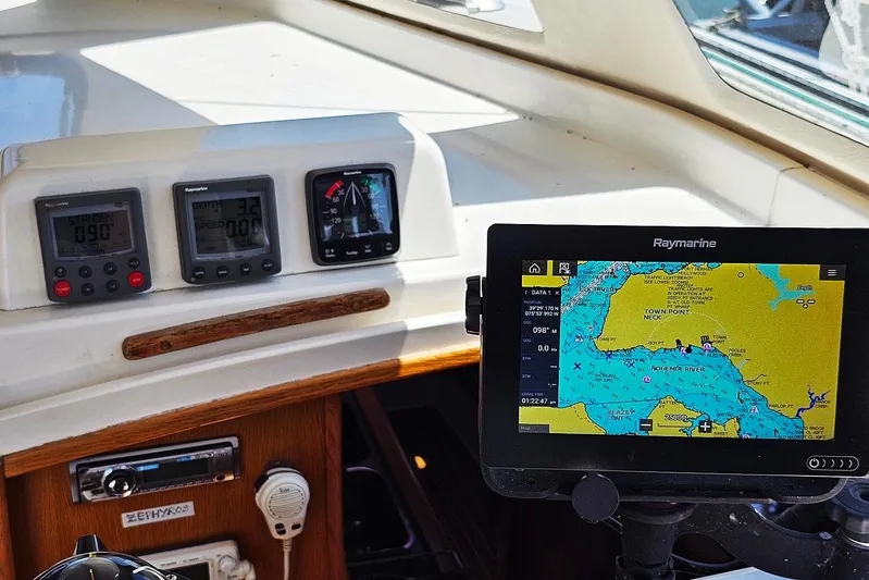 Zephyros Yacht Photos Pics Navigation instruments and Raymarine chartplotter on 2009 Seawind 36XL yacht dashboard.