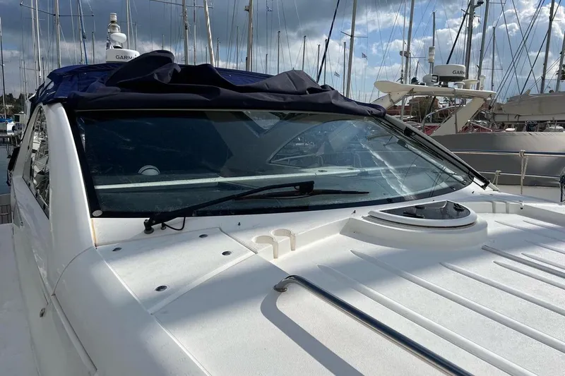  Yacht Photos Pics 2010 Fairline Targa 38 yacht with sleek design, docked in a marina.