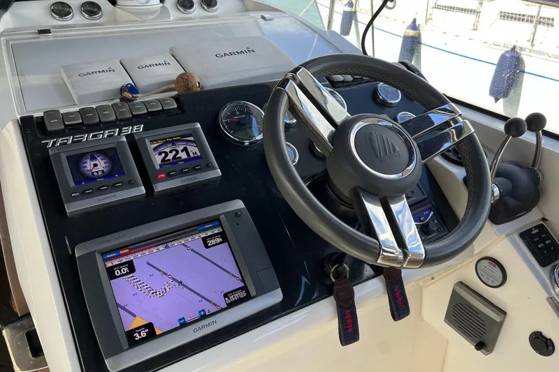  Yacht Photos Pics Control panel of a 2010 Fairline Targa 38 yacht with Garmin navigation systems.