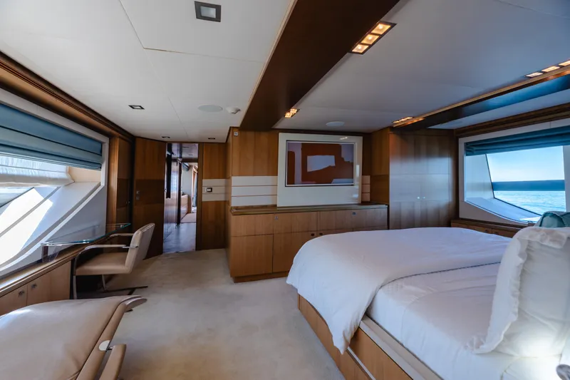  Yacht Photos Pics Luxurious bedroom interior of 2012 Ferretti Yachts Custom Line 100 with ocean view.