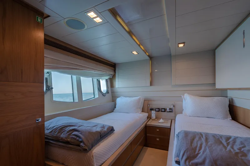  Yacht Photos Pics Luxurious twin cabin interior on 2012 Ferretti Yachts Custom Line 100.