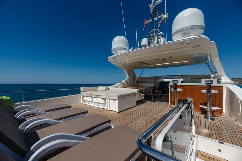  Yacht Photos Pics Luxurious 2012 Ferretti Yachts Custom Line 100 with spacious deck and elegant seating.