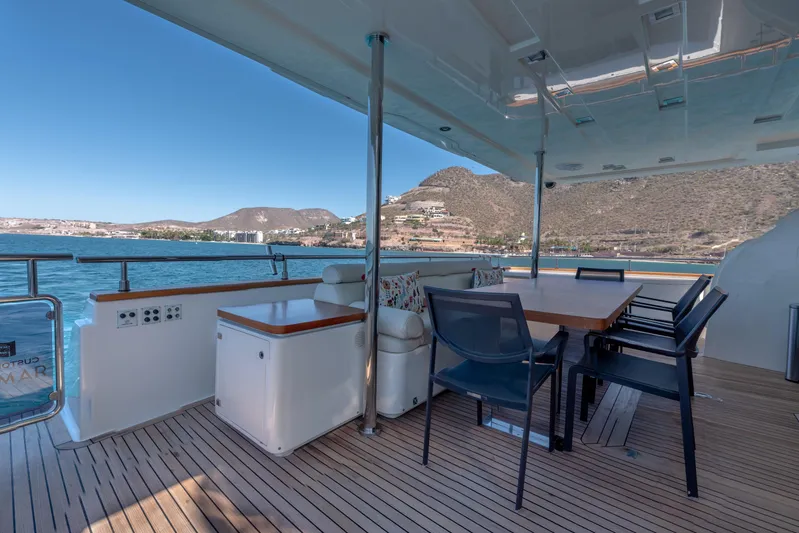  Yacht Photos Pics Luxurious 2012 Ferretti Yachts Custom Line 100 deck with scenic ocean view.