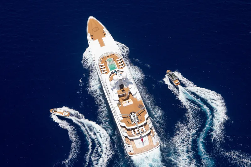 Boardwalk Yacht Photos Pics Luxury Feadship Custom yacht cruising with tenders, 2021 model, aerial view.