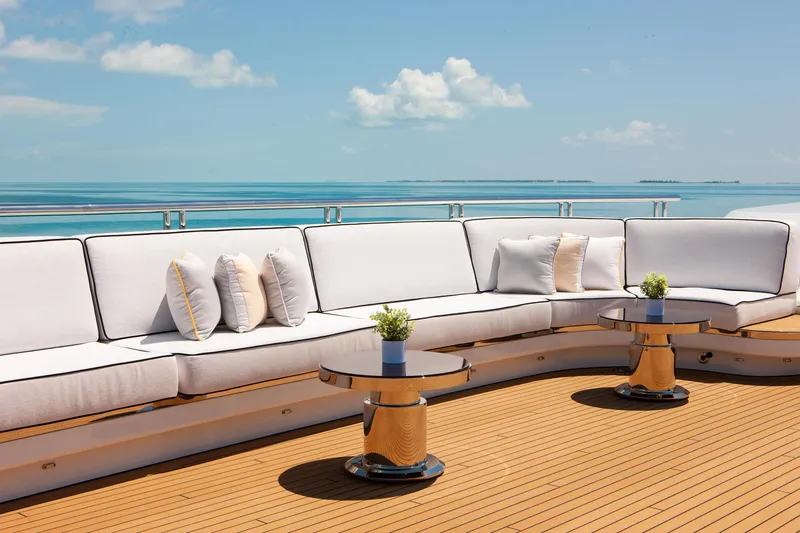 Boardwalk Yacht Photos Pics Luxurious Feadship Custom 2021 yacht deck with elegant seating and ocean view.