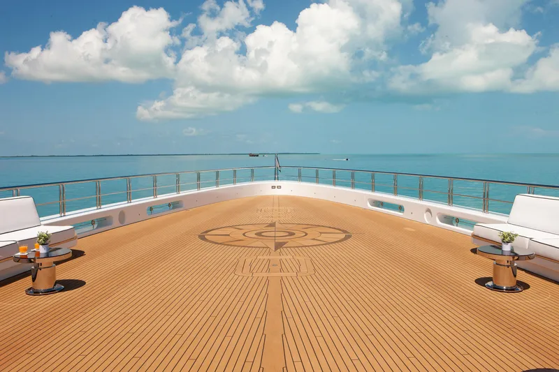 Boardwalk Yacht Photos Pics Luxurious Feadship Custom 2021 yacht deck with ocean view and elegant seating.