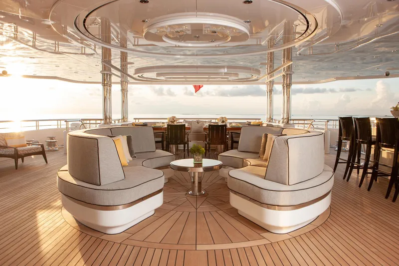 Boardwalk Yacht Photos Pics Luxurious Feadship Custom 2021 yacht deck with elegant seating and ocean view.