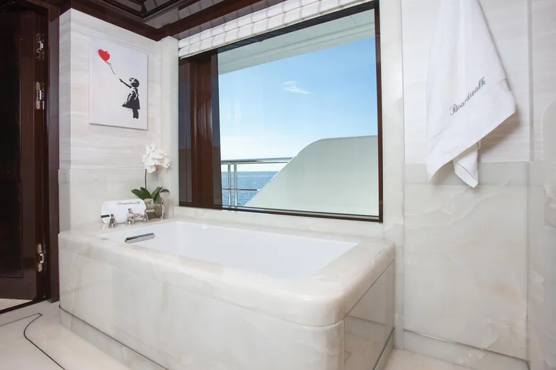 Boardwalk Yacht Photos Pics Luxurious yacht bathroom with ocean view, featuring modern design and elegant decor, Feadship Custom 2021.