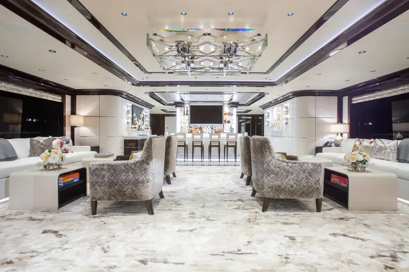 Boardwalk Yacht Photos Pics Luxurious Feadship Costum 2021 yacht interior with elegant seating and modern bar area.