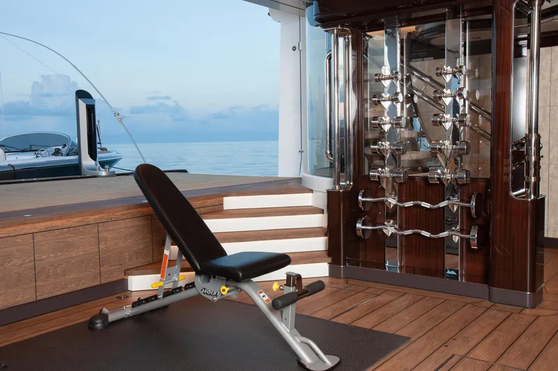 Boardwalk Yacht Photos Pics Luxury yacht gym with modern equipment, Feadship Custom 2021, ocean view.