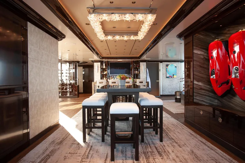 Boardwalk Yacht Photos Pics Luxurious Feadship Custom 2021 yacht interior with elegant dining area and modern decor.
