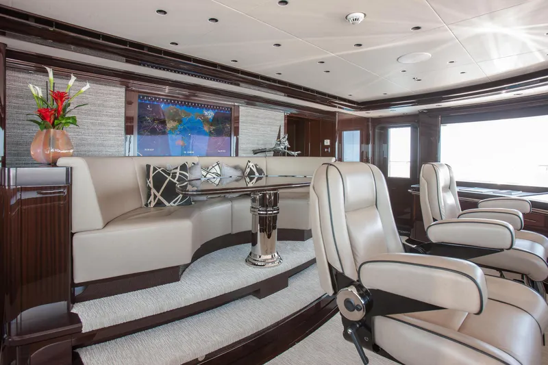 Boardwalk Yacht Photos Pics Luxurious interior of 2021 Feadship Custom yacht with elegant seating and modern decor.