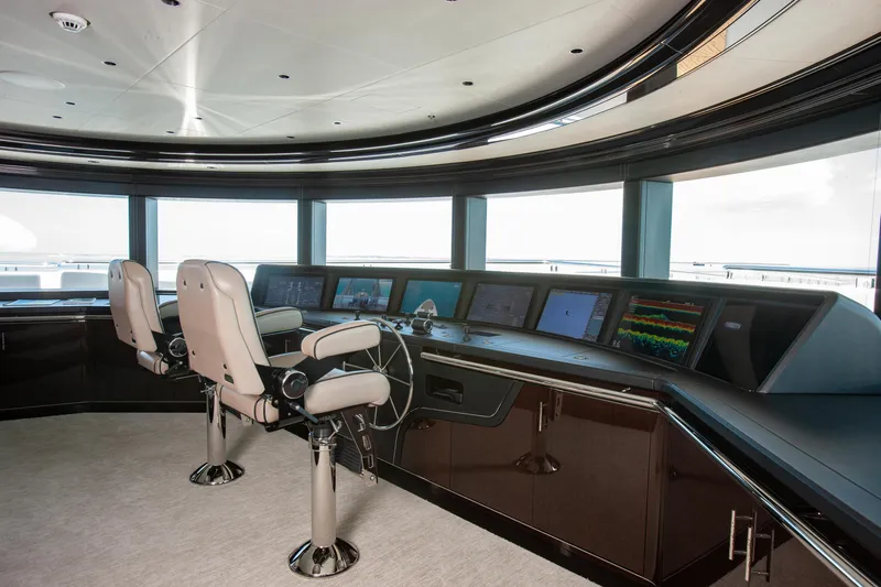 Boardwalk Yacht Photos Pics Luxurious Feadship Costum 2021 yacht bridge with modern navigation equipment and panoramic windows.