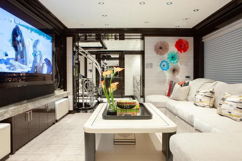 Boardwalk Yacht Photos Pics Luxurious Feadship yacht interior, 2021 model, featuring elegant decor and modern entertainment system.